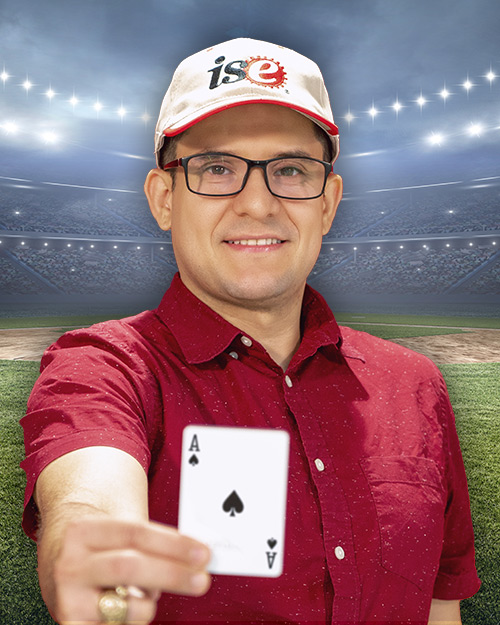 Adolfo Escobedo holding a ace card in front of a stadium.